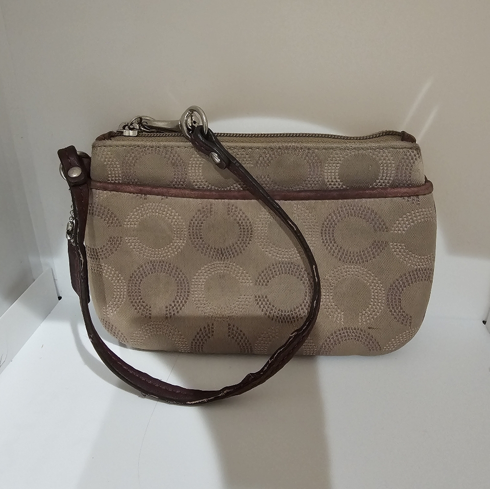 Coach classic wristlet. 6.5x4